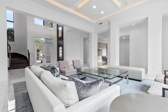 living room featuring a high ceiling, light tile patterned flooring, coffered ceiling, and beam ceiling