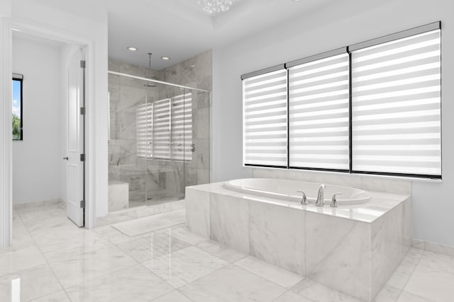 bathroom with shower with separate bathtub