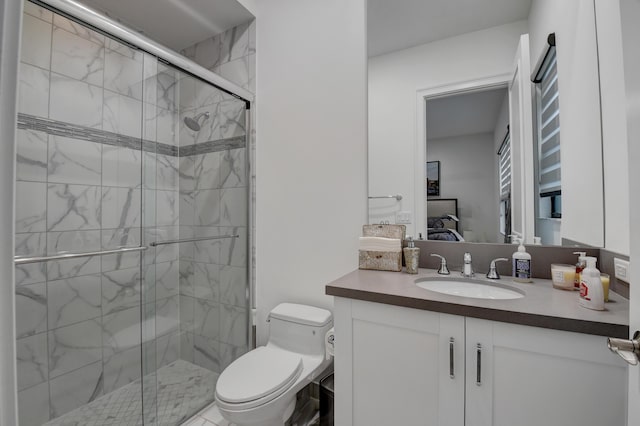 bathroom featuring vanity, toilet, and walk in shower