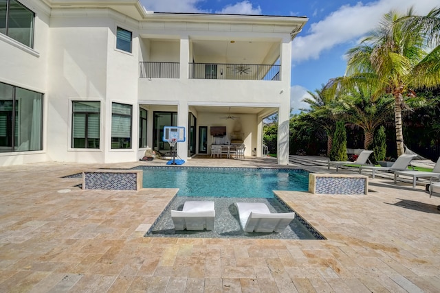 view of swimming pool featuring a patio