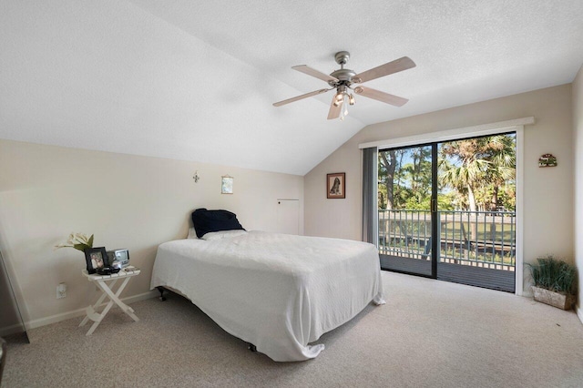 bedroom with carpet flooring, access to exterior, vaulted ceiling, and ceiling fan