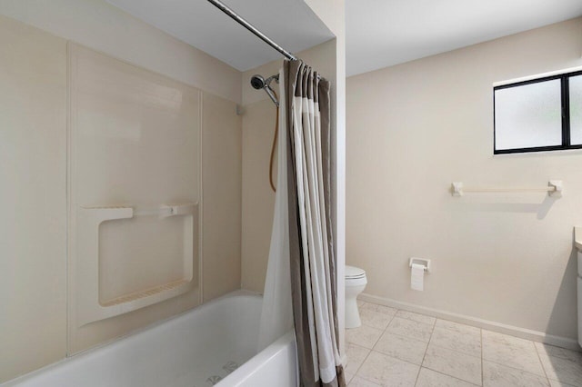 bathroom with tile patterned floors, shower / tub combo with curtain, and toilet