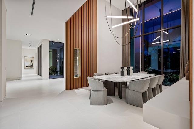 dining space featuring tile patterned flooring