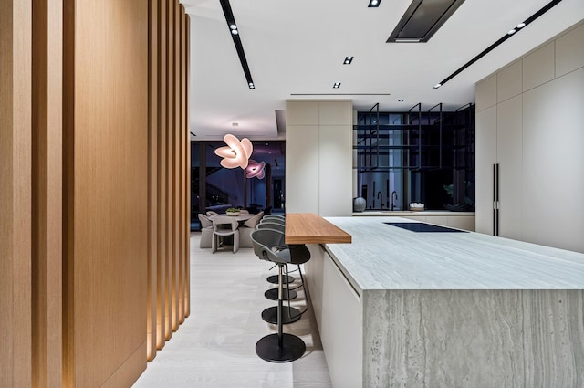 kitchen featuring a breakfast bar area