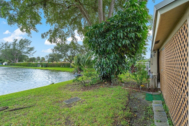 view of yard with a water view