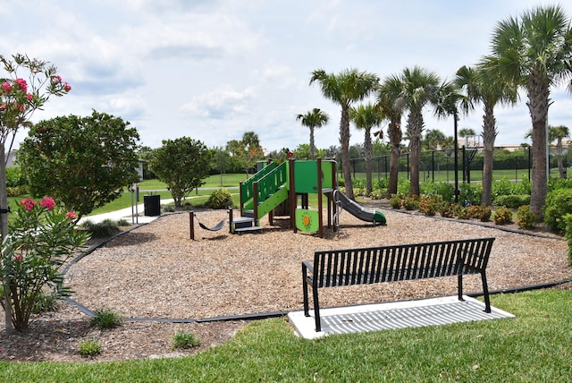 view of playground featuring a lawn