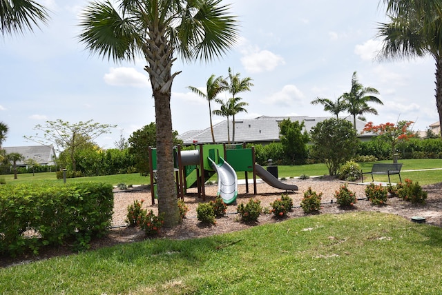 view of play area featuring a lawn