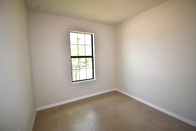 view of tiled spare room