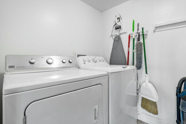 laundry room with washer and clothes dryer