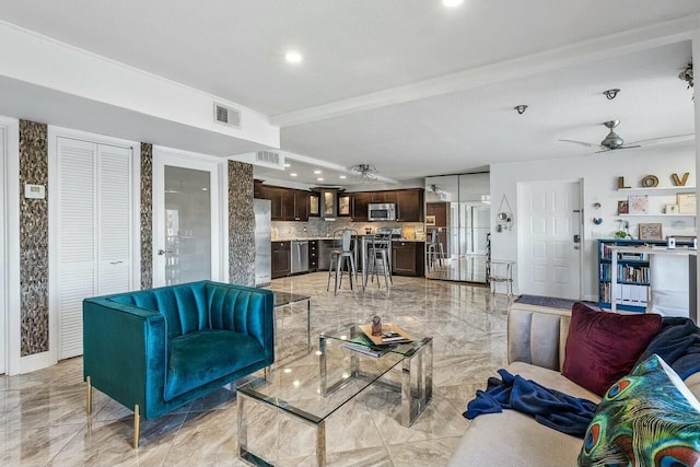 living room featuring ceiling fan