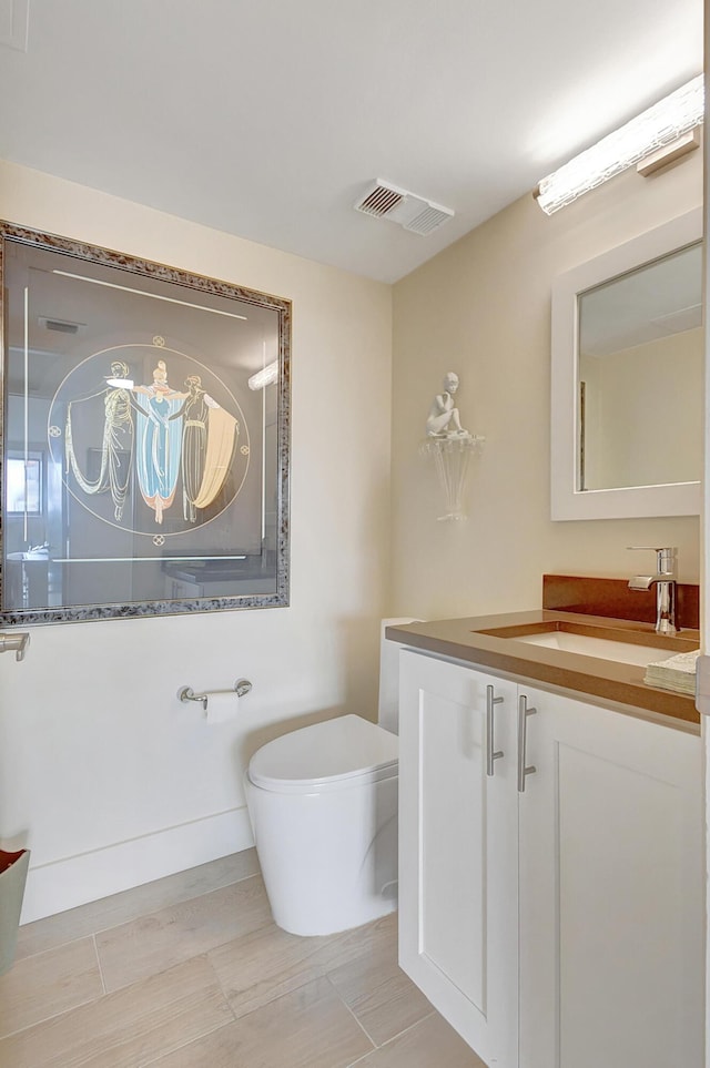 20100 Boca W Dr Unit 125, Boca Raton, FL 33434 - bathroom featuring vanity and toilet