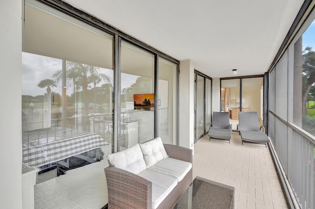 sunroom featuring a wealth of natural light