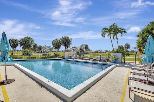 20100 Boca W Dr Unit 125, Boca Raton, FL 33434 - community pool featuring a patio