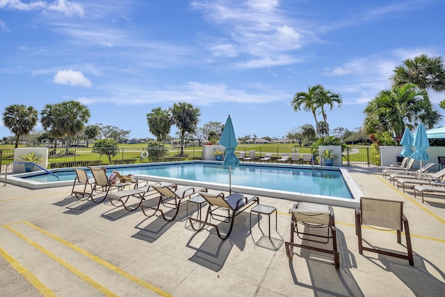 20100 Boca W Dr Unit 125, Boca Raton, FL 33434 - community pool with a patio area