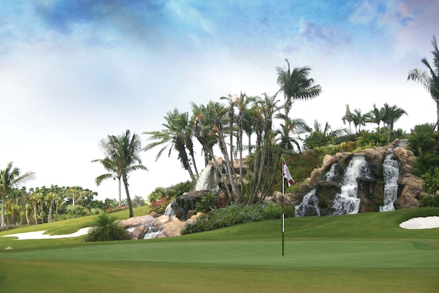 20100 Boca W Dr Unit 125, Boca Raton, FL 33434 - surrounding community featuring an area to practice putting, golf course view, and a yard