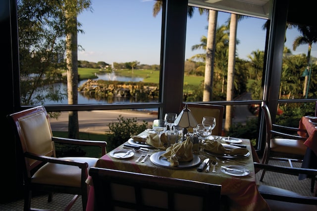 20100 Boca W Dr Unit 125, Boca Raton, FL 33434 - sunroom / solarium featuring a water view