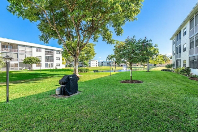 view of home's community featuring a yard