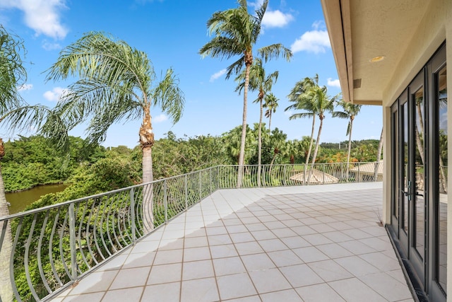 view of patio with a balcony