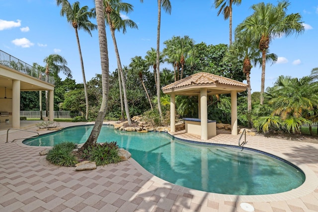 view of pool with a gazebo and a patio area