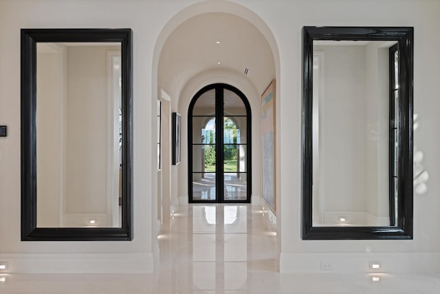 entrance foyer featuring french doors