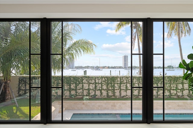 entryway featuring a water view