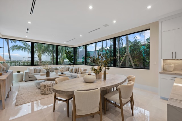 dining room with a wealth of natural light