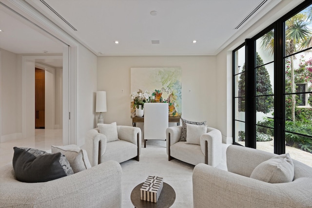 living room with ornamental molding