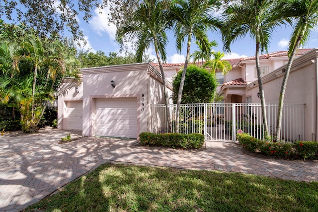 view of front of home with a garage