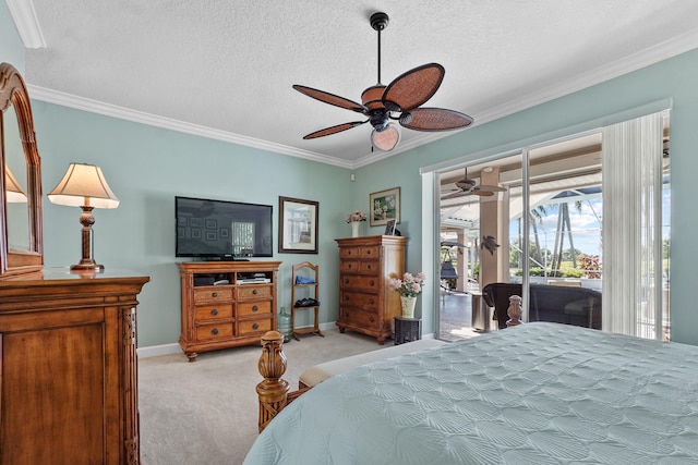 bedroom with access to outside, light colored carpet, a textured ceiling, ceiling fan, and crown molding