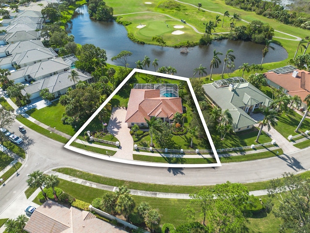 aerial view featuring a water view, a residential view, and golf course view