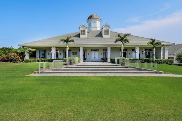 view of front of house featuring a porch and a front lawn