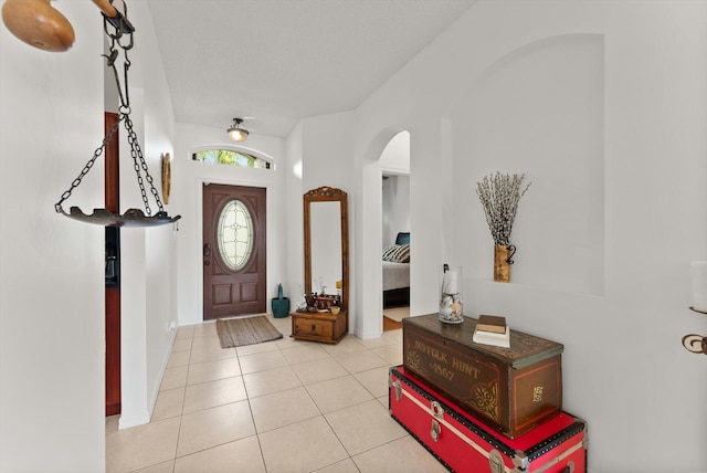 entrance foyer featuring light tile patterned flooring