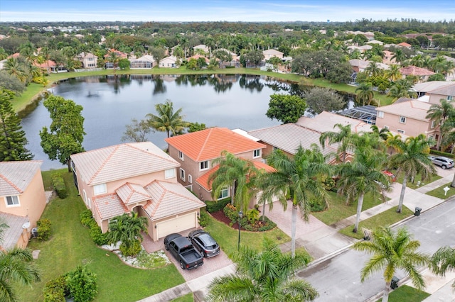 birds eye view of property featuring a water view