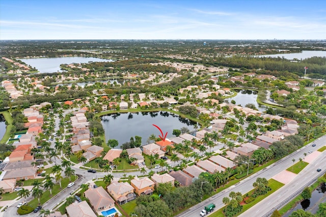 drone / aerial view featuring a water view