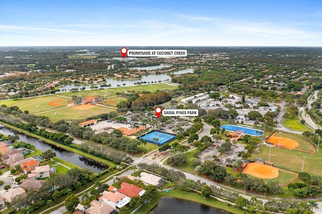 birds eye view of property featuring a water view