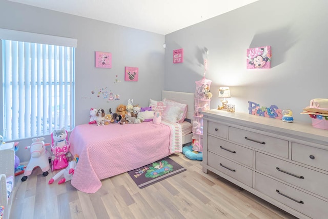 bedroom featuring light wood-type flooring