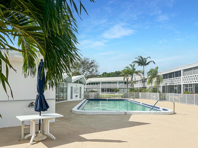 view of pool featuring a patio