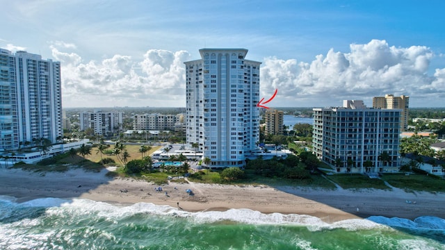 bird's eye view with a view of the beach and a water view