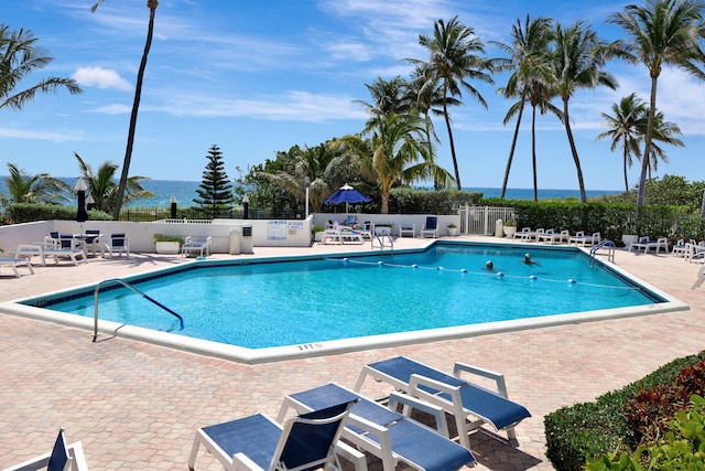 view of swimming pool featuring a patio area