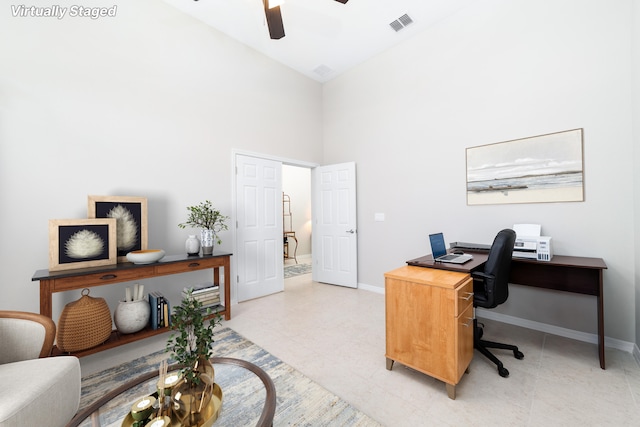 office area featuring high vaulted ceiling and ceiling fan