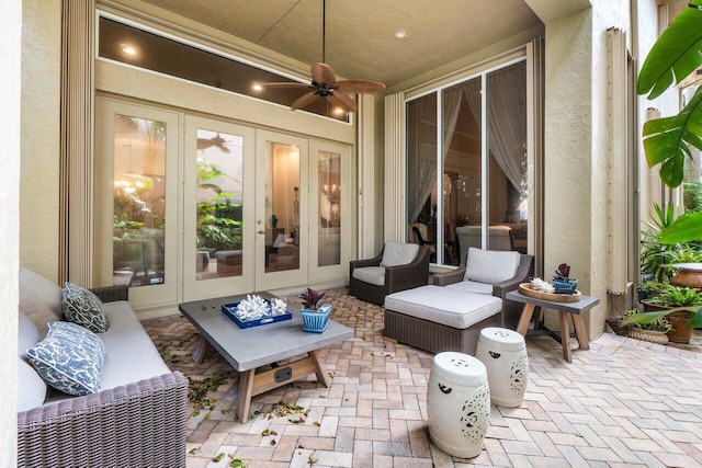 view of patio featuring french doors and ceiling fan