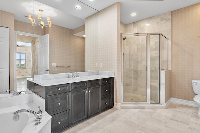 full bathroom with vanity, separate shower and tub, toilet, and an inviting chandelier