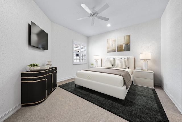 bedroom with carpet flooring, ceiling fan, and vaulted ceiling