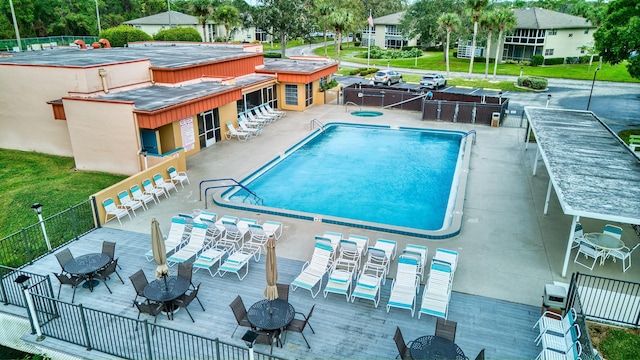 view of swimming pool featuring a patio