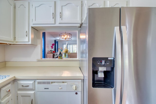 kitchen featuring white cabinets, stainless steel refrigerator with ice dispenser, dishwasher, and a notable chandelier