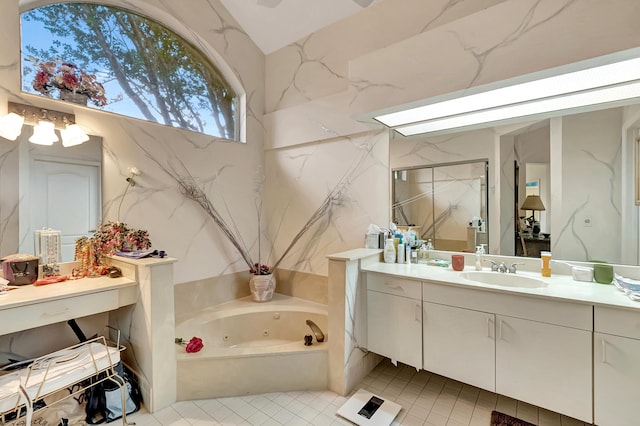 bathroom featuring vanity and shower with separate bathtub