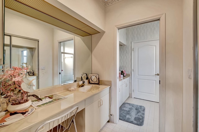 bathroom featuring tile patterned floors and vanity