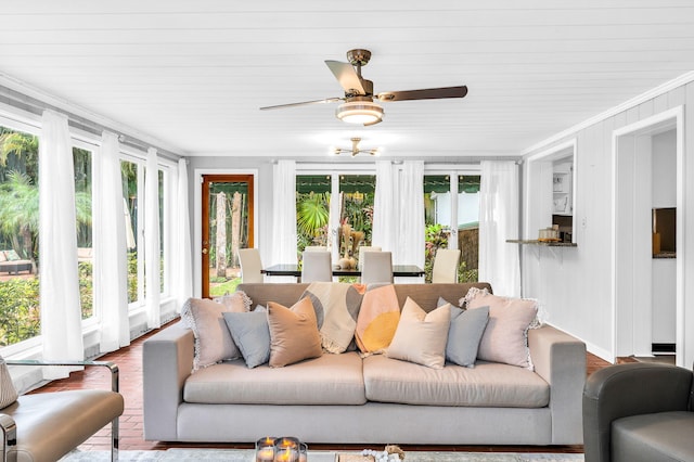 sunroom / solarium with ceiling fan