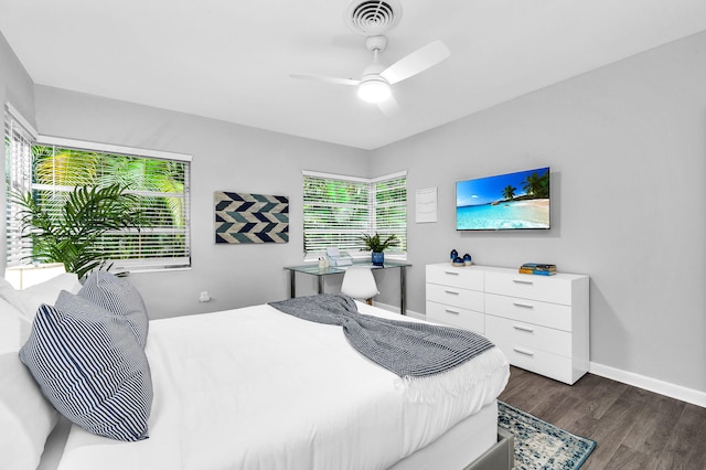 bedroom featuring dark wood-type flooring and ceiling fan