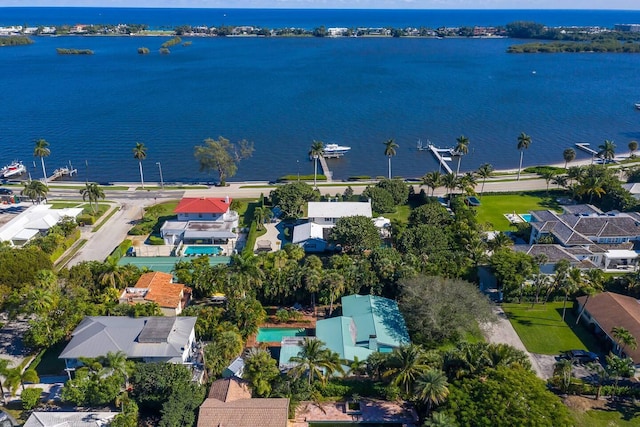 birds eye view of property featuring a water view